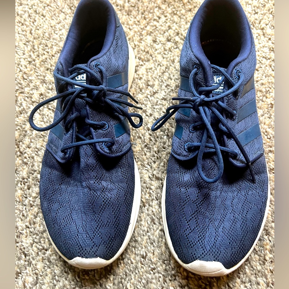 Blue adidas cloud foam tennis shoes